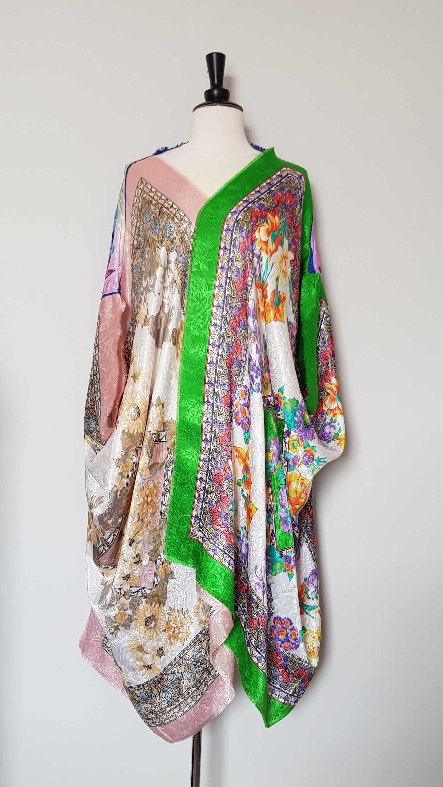 Mid length pink and green floral patterned kaftan